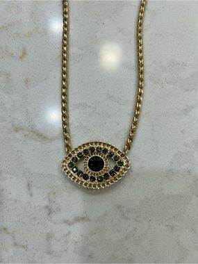 Gold Evil Eye Pendant Necklace with Blue Crystal Accents